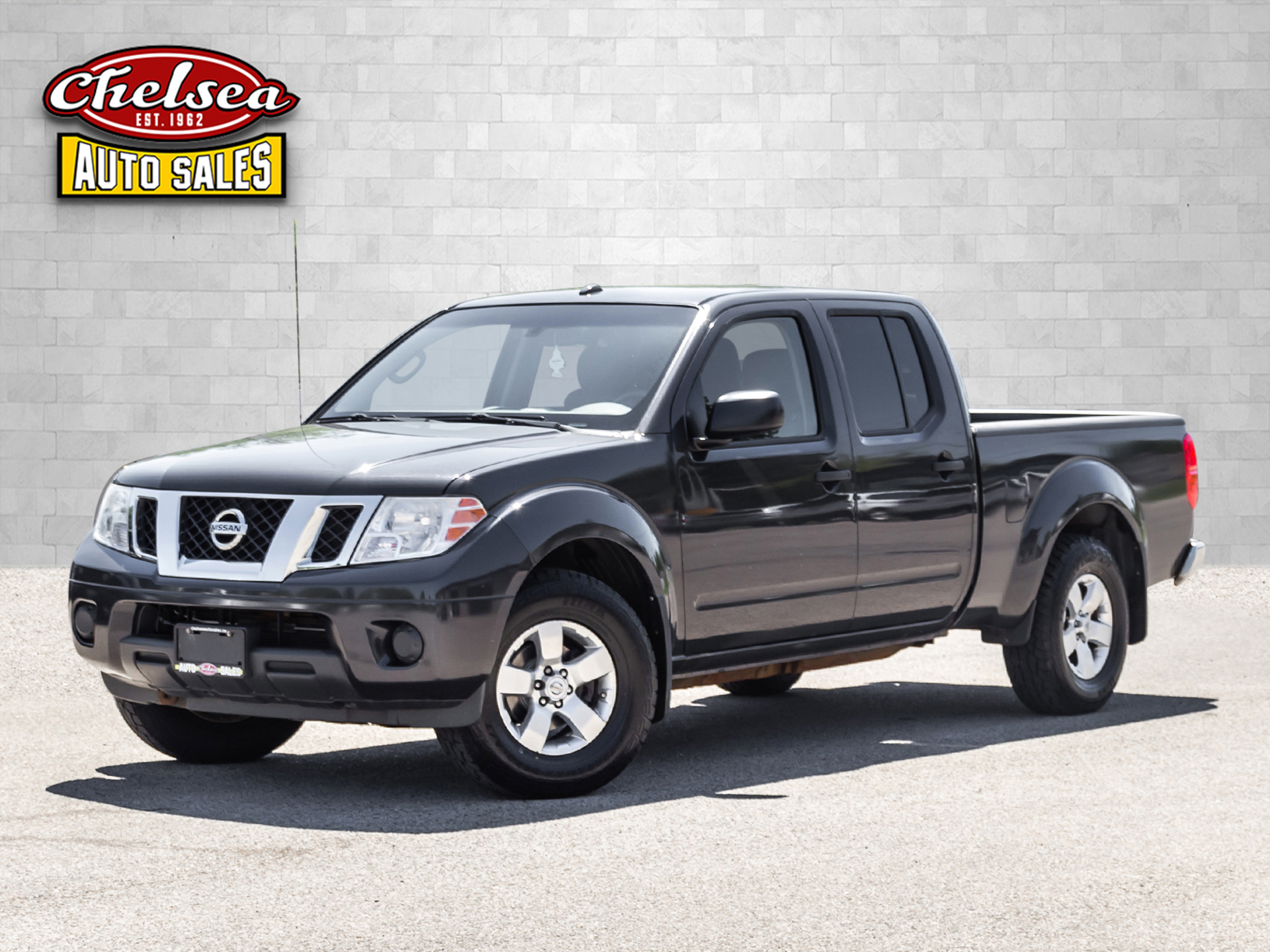 Blue 2013 Nissan Frontier Pickup Truck Four-Wheel Drive Automatic