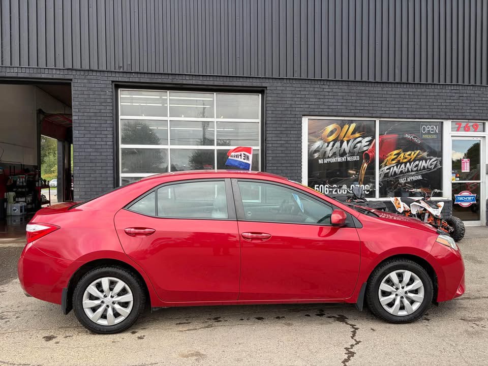 Red 2015 Toyota Corolla Sedan Front-Wheel Drive Automatic