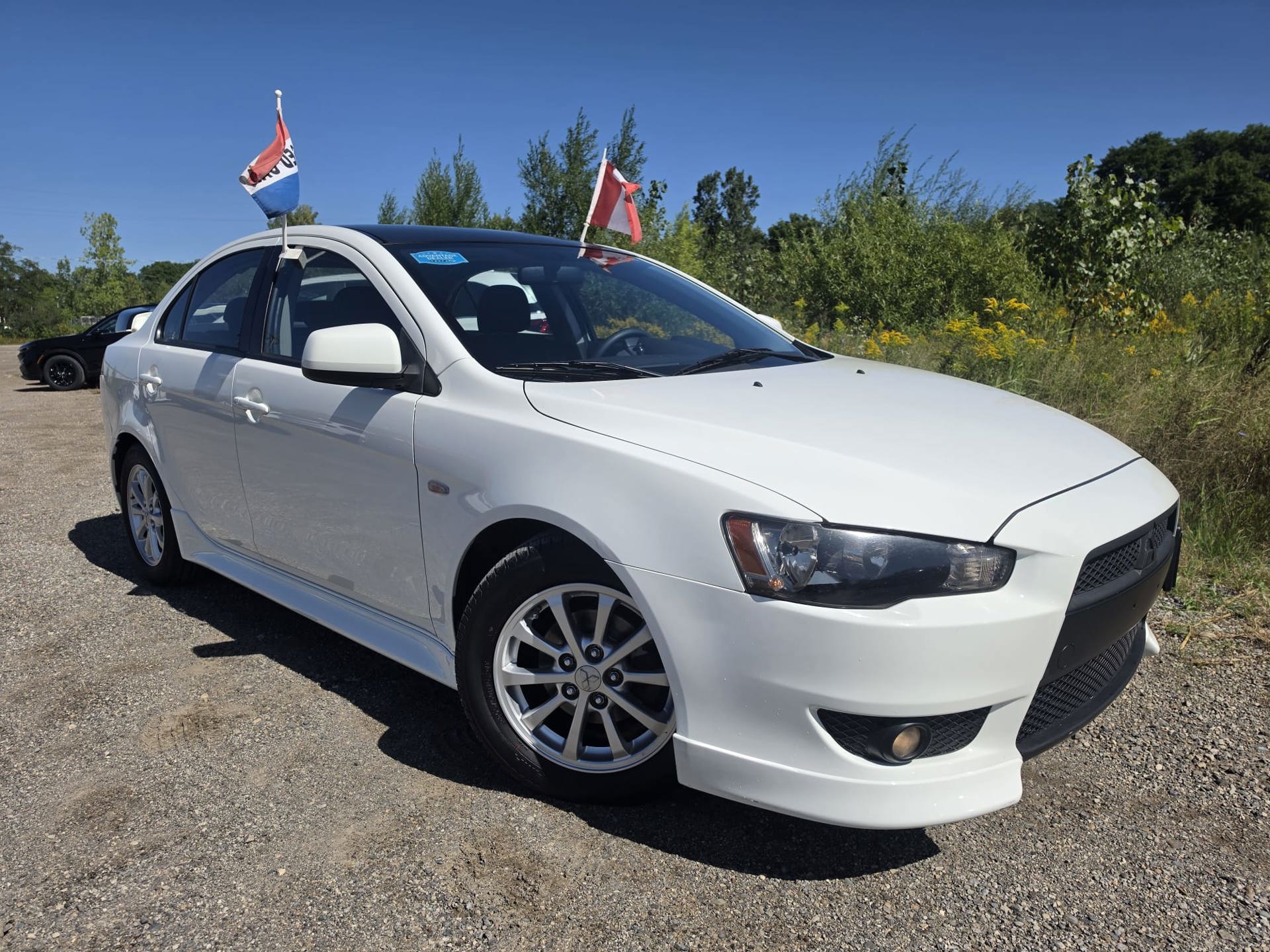 White 2010 Mitsubishi Lancer Sedan Front-Wheel Drive Automatic